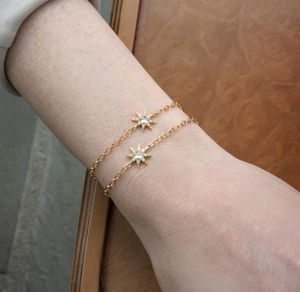 gold chain bracelet with diamond star from engagement ring designer parker bingham jewelers